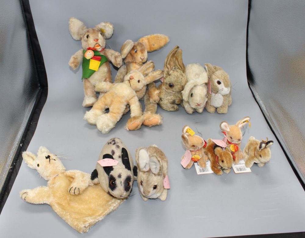 A collection of mostly Steiff soft toy rabbits